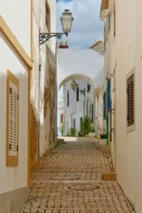Narrow cobbled street in Albufeira
